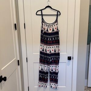 NWT Festive Holiday Jumpsuit with Deer & Trees. Adjustable straps & pockets.